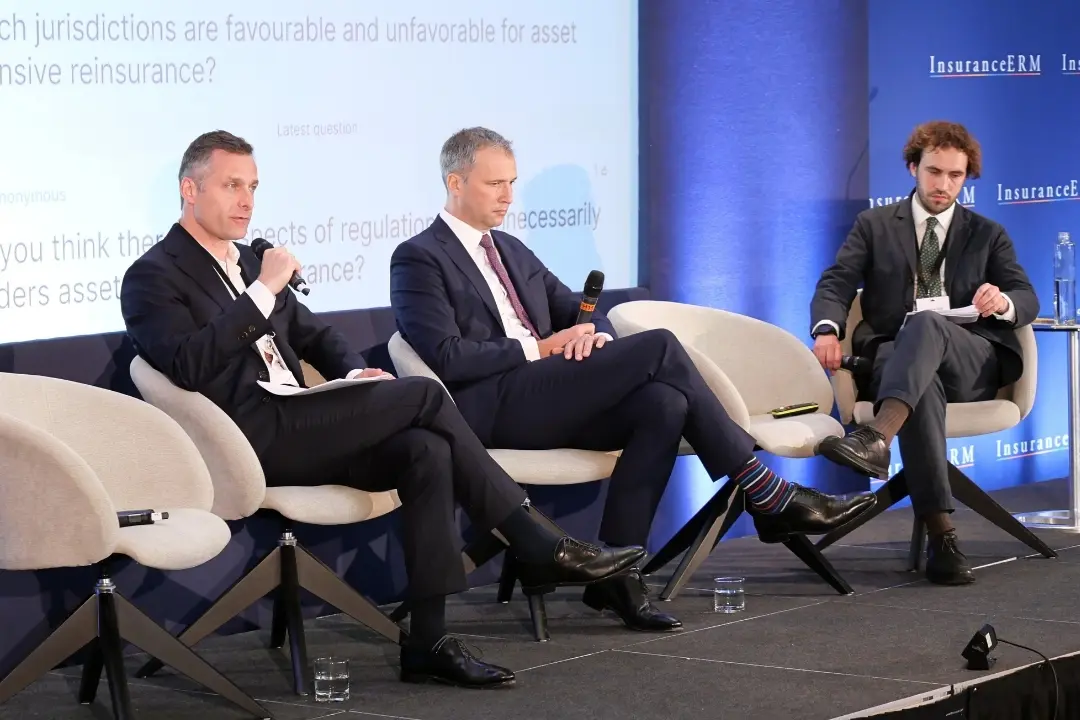 Joshua Geer hosting a conference panel for InsuranceERM