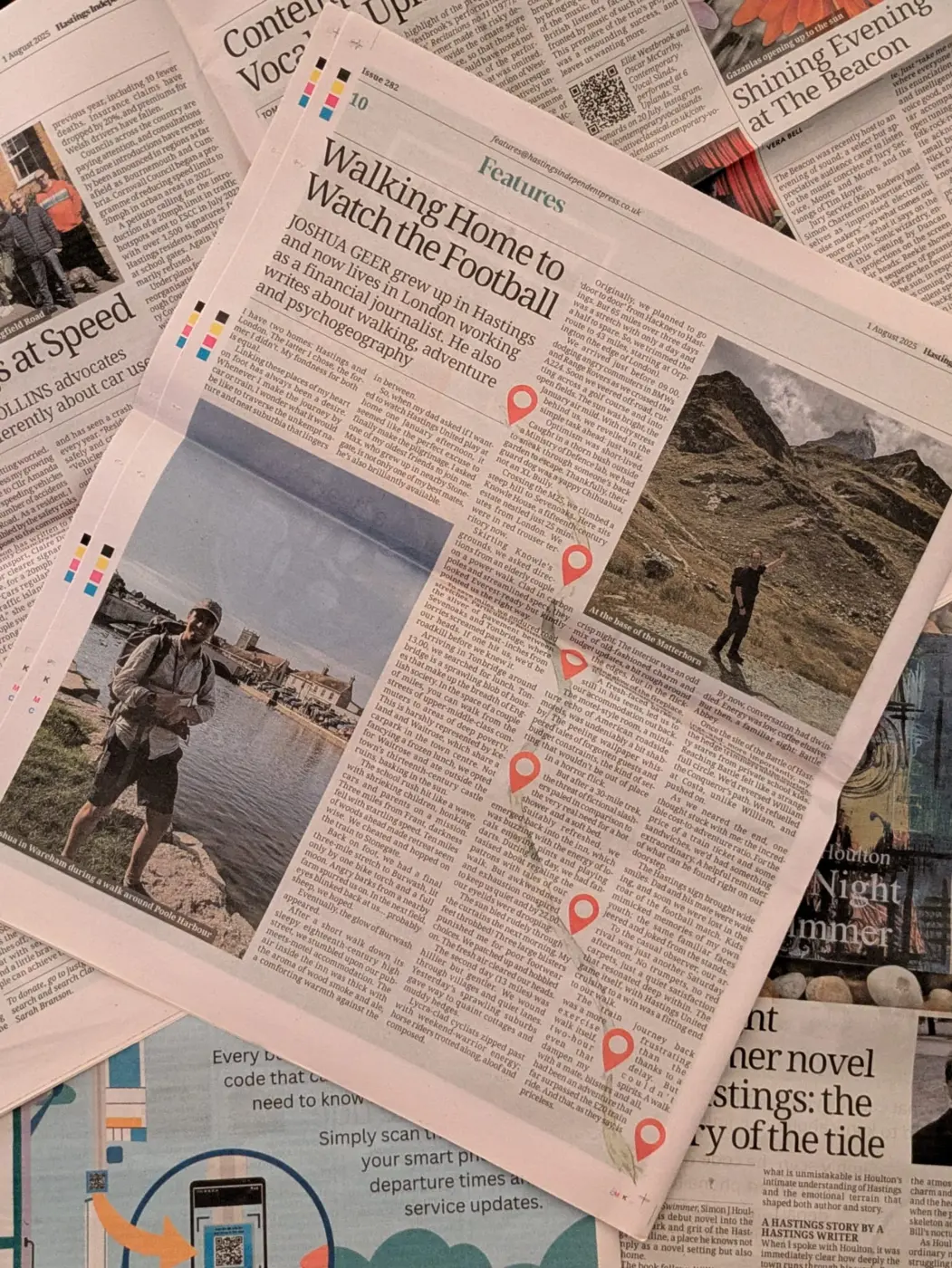 A published feature by Joshua Geer surrounded by newspaper pages